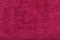 shaggy surface. fine grain felt red fabric. texture polyester close-up. dark pink fleecy background