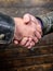 Shaking hands close up. Handshake friendly gesture. Handshake gesture concept. Partnership and business deal. Successful