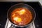 Shakshouka spicy tomato stew with chicken eggs traditional vegetarian dish