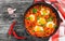 Shakshuka - fried eggs, onion, bell pepper, tomatoes, chili