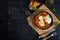 Shakshuka with grilled bread. Fried eggs with tomato, pepper, garlic and herbs