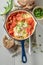 Shakshuka served with wholemeal bread. Tunisian cuisine. Perfect for breakfast