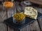 Shakshuka or shaksoka with bread served in a dish isolated on cutting board side view of breakfast on wooden background