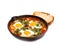 Shakshuka with Spinach and Harissa in a frying pan on white background. Colorful breakfast.Traditional cuisine of Israel