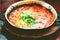 Shakshuka. Traditional jewish food and middle eastern cuisine recipe. Fried eggs, tomatoes, bell pepper and parsley in a