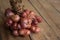 Shallots group on wood