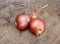 Shallots on old wooden