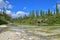 Shallow brackish river stream flowing towards Natural Pool at Ile des Pins, New Caledonia.