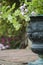 Shallow depth of field image of English country garden with urn