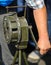 Shallow depth of field image with a man handling a vintage hand crank air raid siren