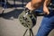 Shallow depth of field image with a man handling a vintage hand crank air raid siren