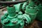 Shallow depth of field image with worn out heavy iron industrial equipment used in the oil and gas drilling industry rusty bolts