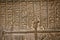 Shallow depth of field selective focus and close up image with Egyptian hieroglyphs on a historic replica