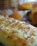 Shallow focus close up of rosemary and garlic focaccia bread, wi