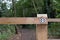 Shallow focus of a newly installed gate and footpath sign at a well-known, long circular walk.
