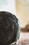 Shallow focus shot of an old granite boulder in the middle of rusty empty abandoned room