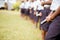 Shallow focus shot of a person wearing a uniform and holding the bible