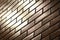 Shallow focus of sun light reflecting off glossy brown subway tile brick wall in diagonal pattern