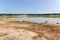 Shallow lake on-site abandoned quarry of ilmenite ore