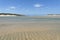 Shallow rippled water across the Bushmans River estuary at low tide.