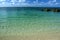 Shallow tropical water and sandy beach