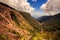 Shallow Wooded Canyon Walkway Stony Slope Forest on Top