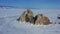 Shaman rock in frozen lake Baikal