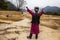 Shaman summoning spirits at the mineral terraces in Baishutai, China. The magic, incantation, occultism.