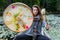 Shamanic holding sacred drum with fur stick