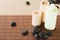 Shampoo bottle, massage stones and candles
