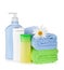 Shampoo and gel bottles with towels and flower