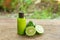 Shampoo made of bergamot in green plastic bottle.