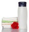 Shampoo and towel with red soap rose