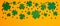 Shamrock four and three leaf clovers frame border on orange background. Happy St. Patrick`s day concept