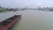 SHANGHAI, CHINA - MAY 7, 2017: Aerial drone view of cargo vessels sailing over the Huangpu river