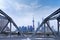 Shanghai cityscape with steel bridge structure frame, high rises office and towers of the Business district skyline at