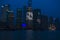 Shanghai at night  advertising on skyscrapers  full moon and illuminated sailer