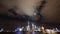 Shanghai at night,Brightly lit ship passing world economic hub,cloud in sky.
