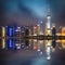 Shanghai pudong skyline with reflection at night