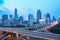 Shanghai skyline with traffic at dusk