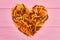 Shape of heart from fusilli pasta.
