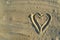 Shape of heart in the sand with copy space