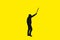 Shape of man with stick in hands. Protesting against unfair politics. Isolated on yellow background