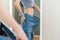 Shape slender, thin waist, attractive slim asian young woman, beautiful girl hand show shape her weight loss, wearing in big,