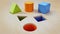 Shape sorter puzzle toy with square, circle and triangle shapes. 3D illustration