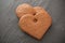 Shaped heart biscuits on chalkboard background