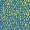 Shapeless modern yellow drops on a blue background. Seamless trendy pattern for fabrics.