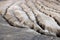 Shapes in ground formed by the mud flows at Muddy Volcanoes of Paclele Mari, near Buzau.