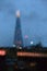 The Shard, blurred thru a window full of rain drops - 87-floor glass skyscraper with a jagged peak, with restaurants, offices,