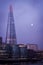 The Shard and Thames riverside with moon before sunrise